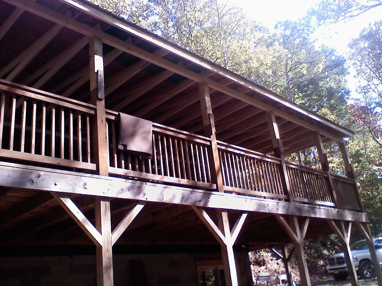 Timber framing under a new elevated porch and deck — Roof Leak Repair in Sandy Lake by Roofing Brothers